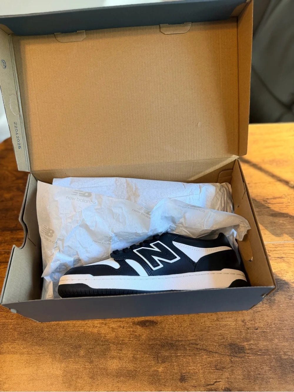 New Balance Black and White Leather Sneakers 7M/8.5W